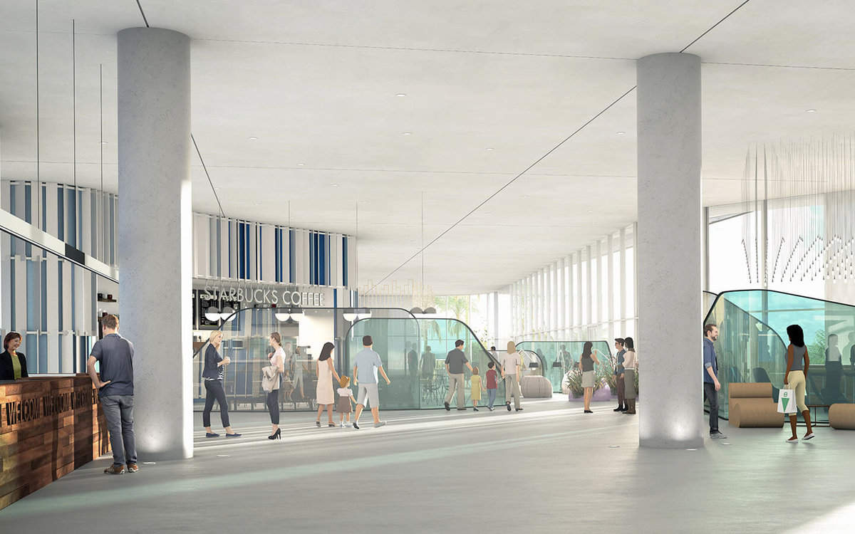 A group of people standing in a building