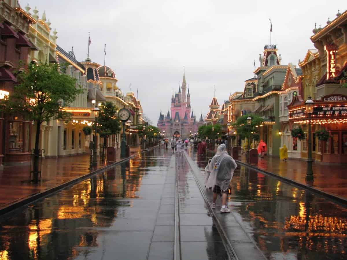 People walking in the rain at Magic Kingdom 