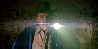A man that is standing in the dark