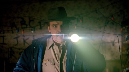 A man that is standing in the dark