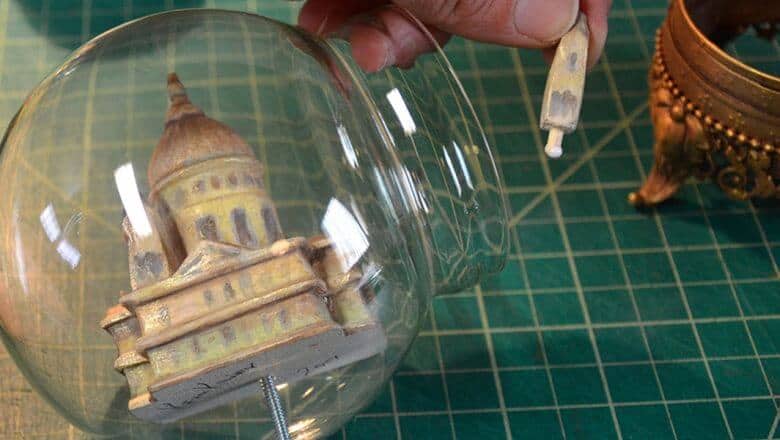 Building inside a glass globe