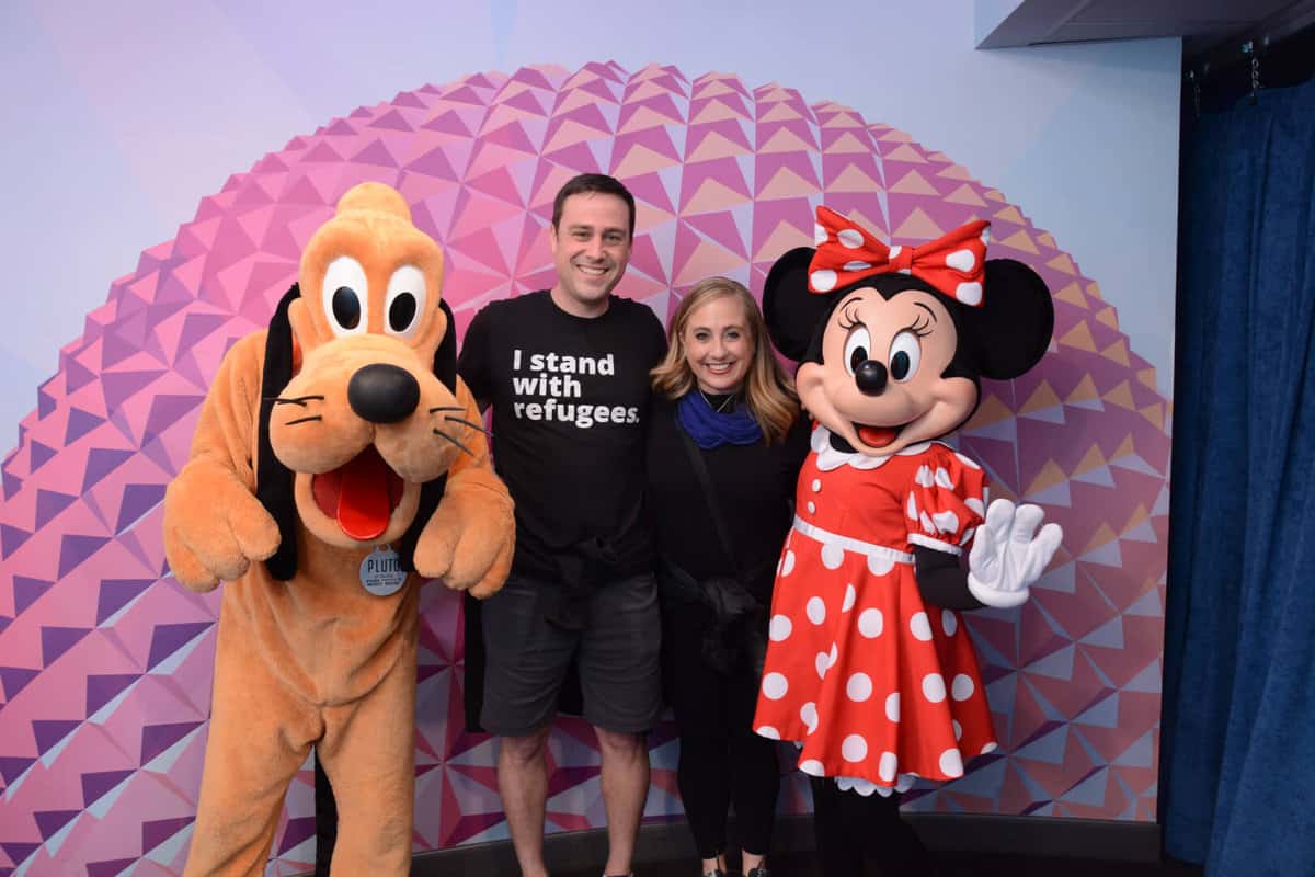 Guests with Minnie Mouse and Pluto at the Disney Visa character meet-and-greet at EPCOT.