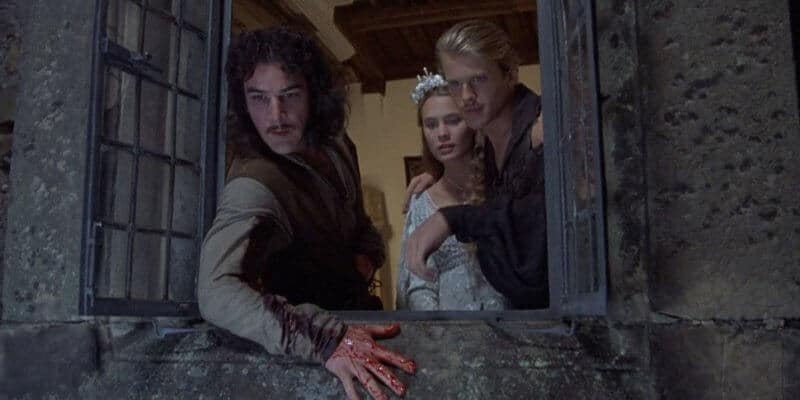 Princess Bride and two men looking out a window