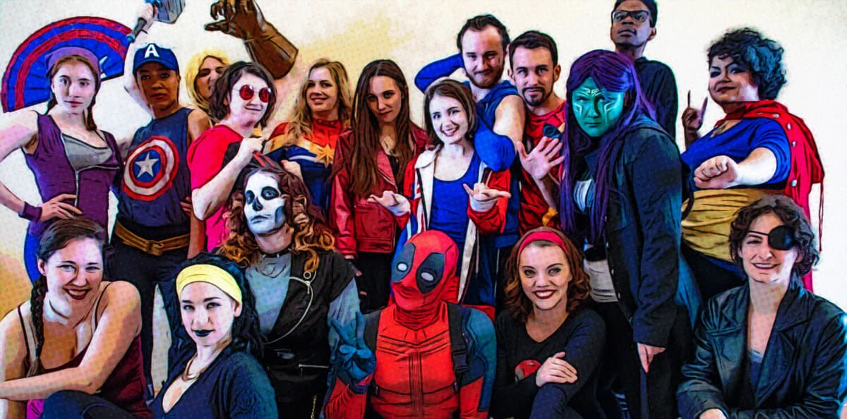 A group of people in Marvel costumes
