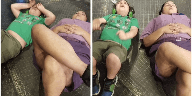 Two girls laying on the floor