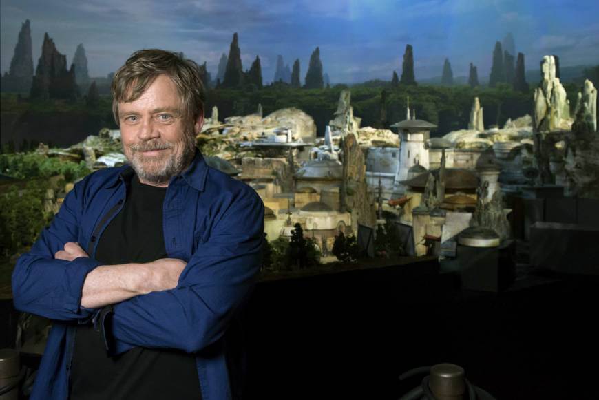Mark Hamill in front of Millennium Falcon: Smugglers Run
