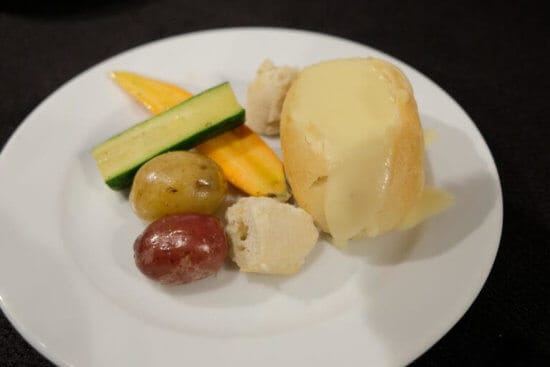 Cheese Fondue in a Bread Bowl with Fresh Steamed Baby Vegetables and Marble Potatoes