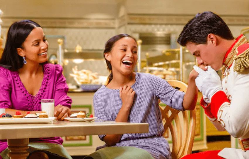 Guests enjoying themselves at 1900 Park Fare Dinner at the Grand Floridian Resort at Disney World. 