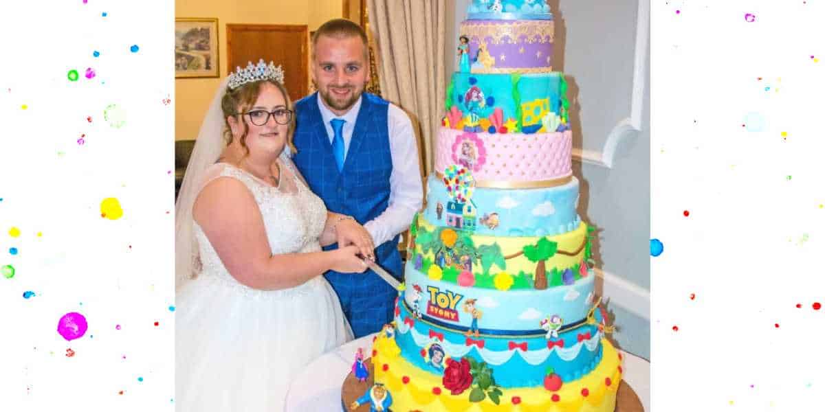 Disney Wedding cake with several Disney movie themes