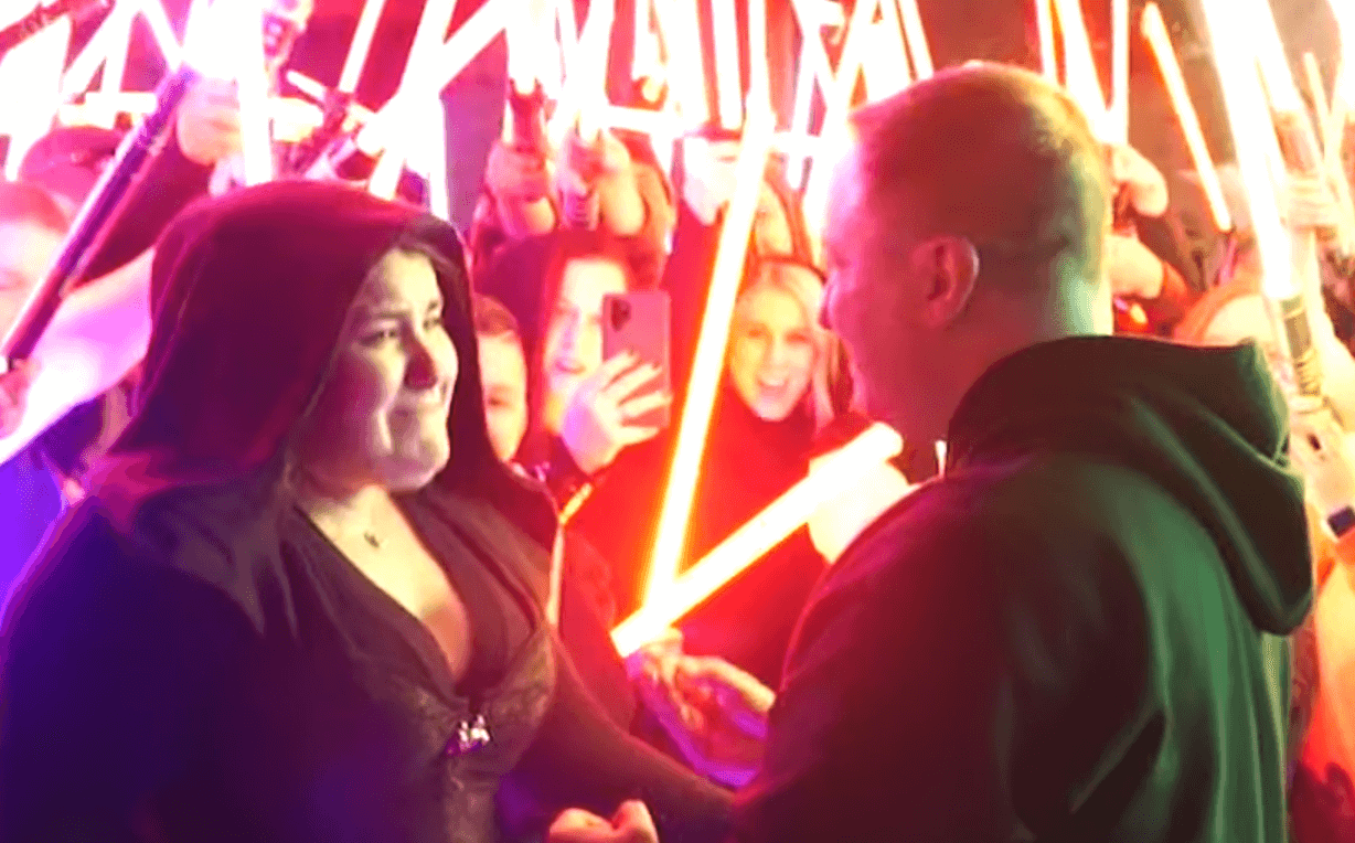 Proposal at Galaxy’s Edge surrounded by Lightsabers