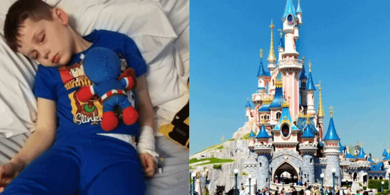 A kid sleeping with a doll and Disneyland´s castle