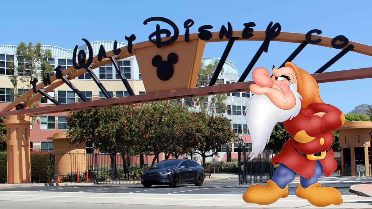 The Walt Disney Co entrance and a cartoon dwarf looking angry 