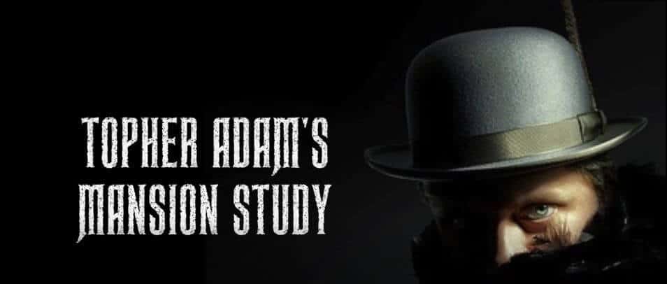 Topher Adam wearing a hat