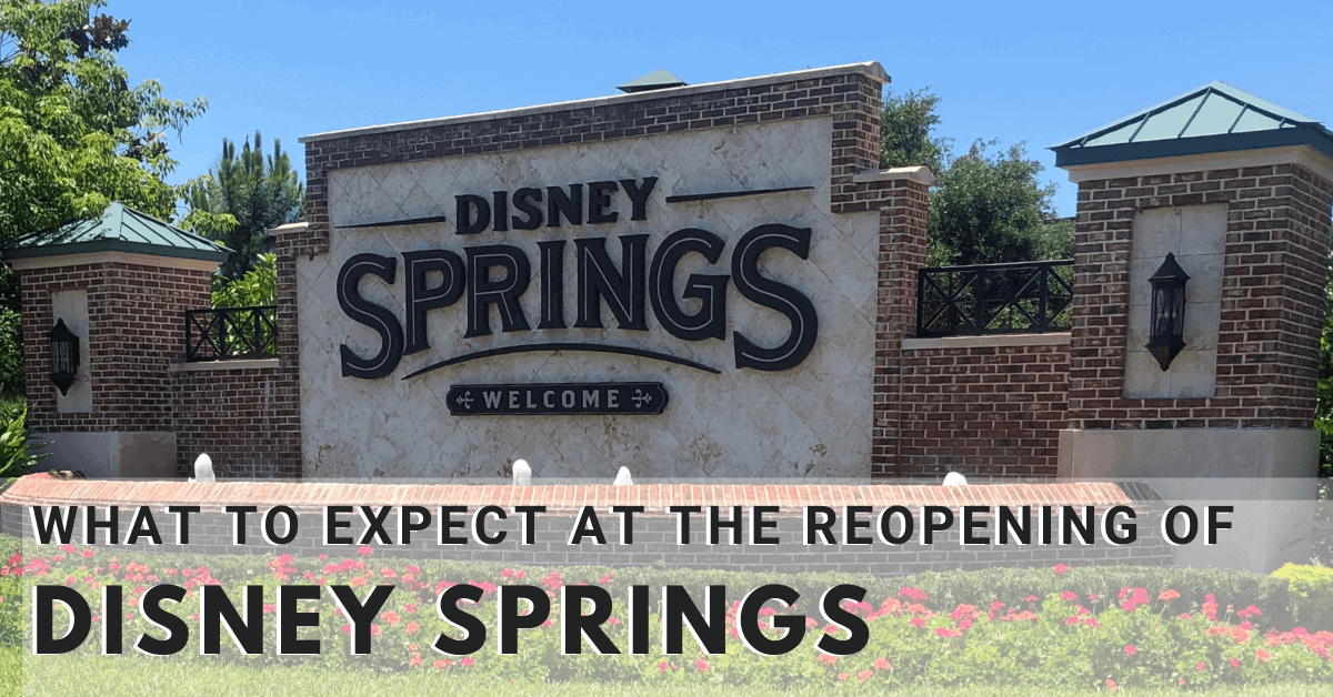 A sign in front of a brick building