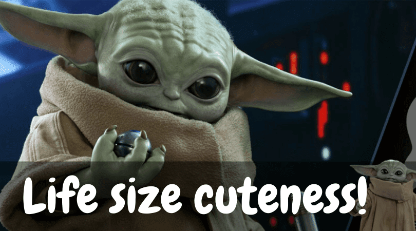 Baby Yoda doll and text