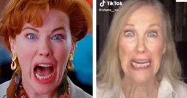 A close up of Catherine O'Hara smiling for the camera