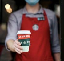 starbucks barista with red cup