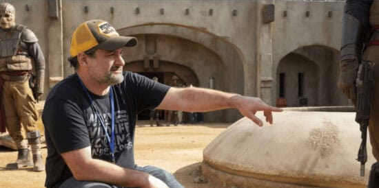 Dave Filoni pointing in 'Disney Gallery: The Mandalorian'