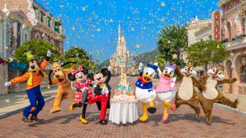 Disney Characters in front of Disney Castle