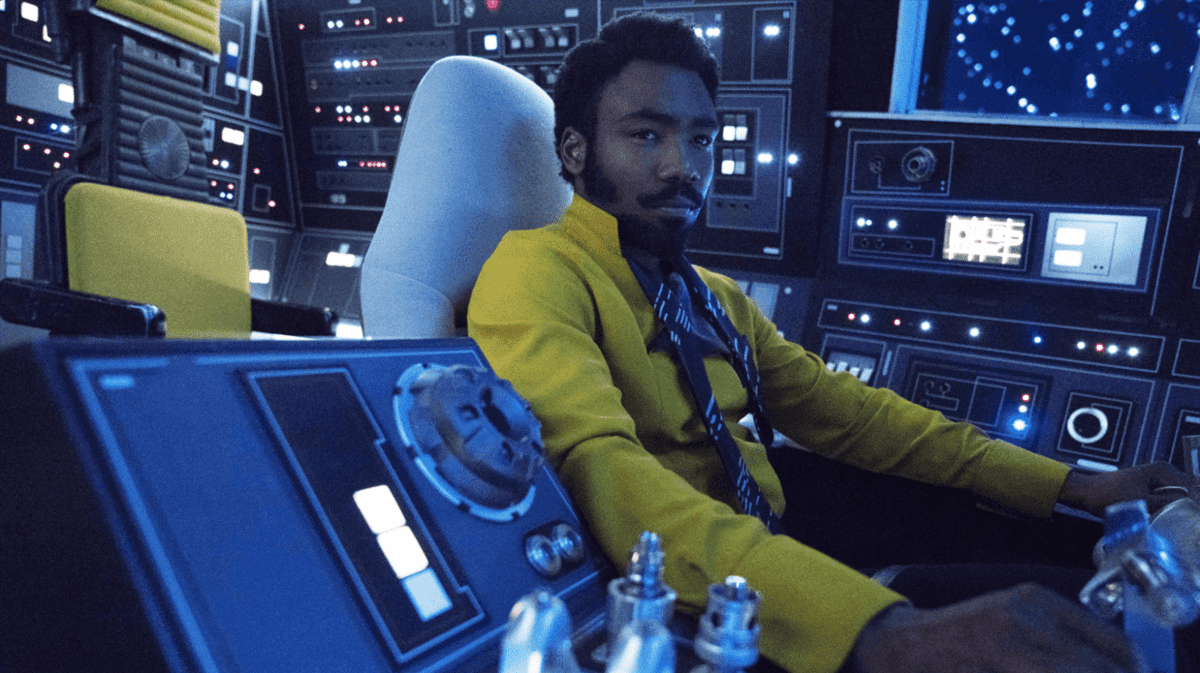 Donald glover as Lando Calrissian in a room surrounded by computers