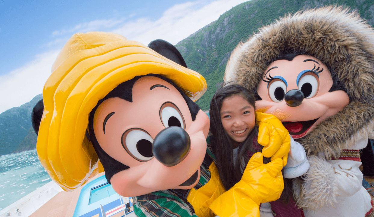 mickey and minnie hugging little girl disney cruise line alaska