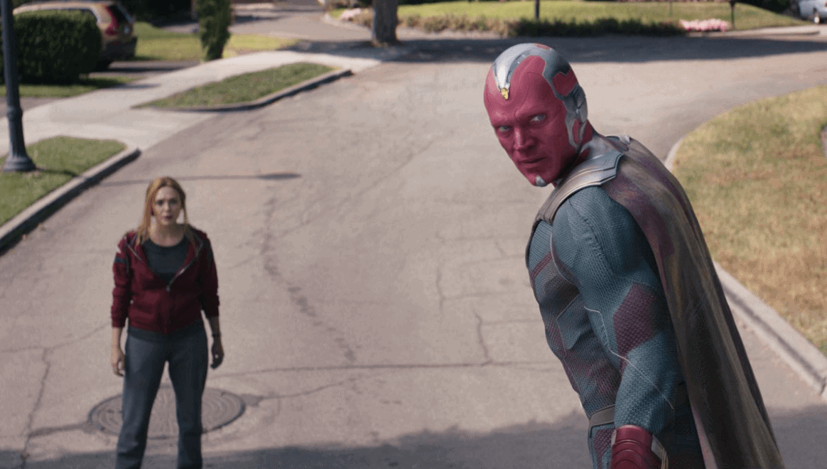 vision flying while wanda stands below