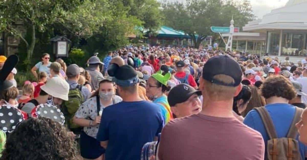 A group of people standing in front of a crowd