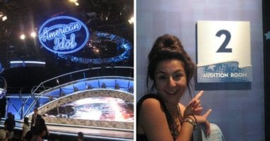 A woman standing in front of a store