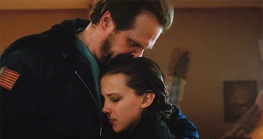 david harbour (left) and millie bobby brown (right) in stranger things