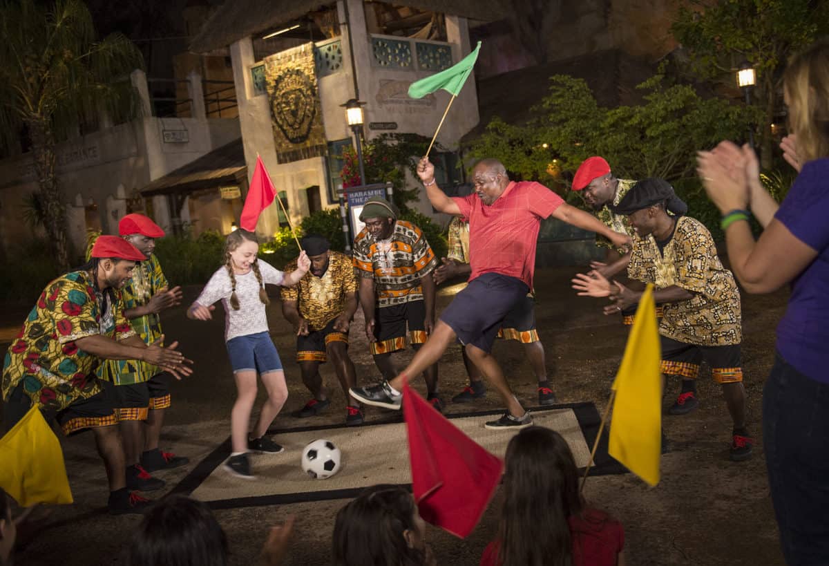 Families dance at an animal kingdom enterainment