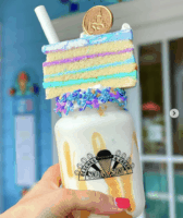 Disney Guests Eat a Potentially Revolting Funnel Cake Hot Dog