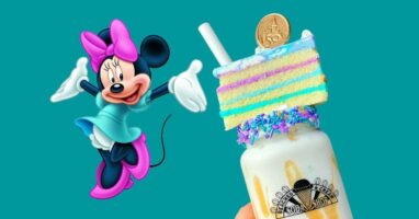 Minnie Mouse next to cake