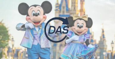 Mickey and Minnie in front of Cinderella Castle with DAS logo in foreground