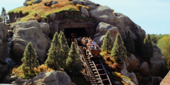 Guests go down the tallest hill on Seven Dwarfs Mine Train. 