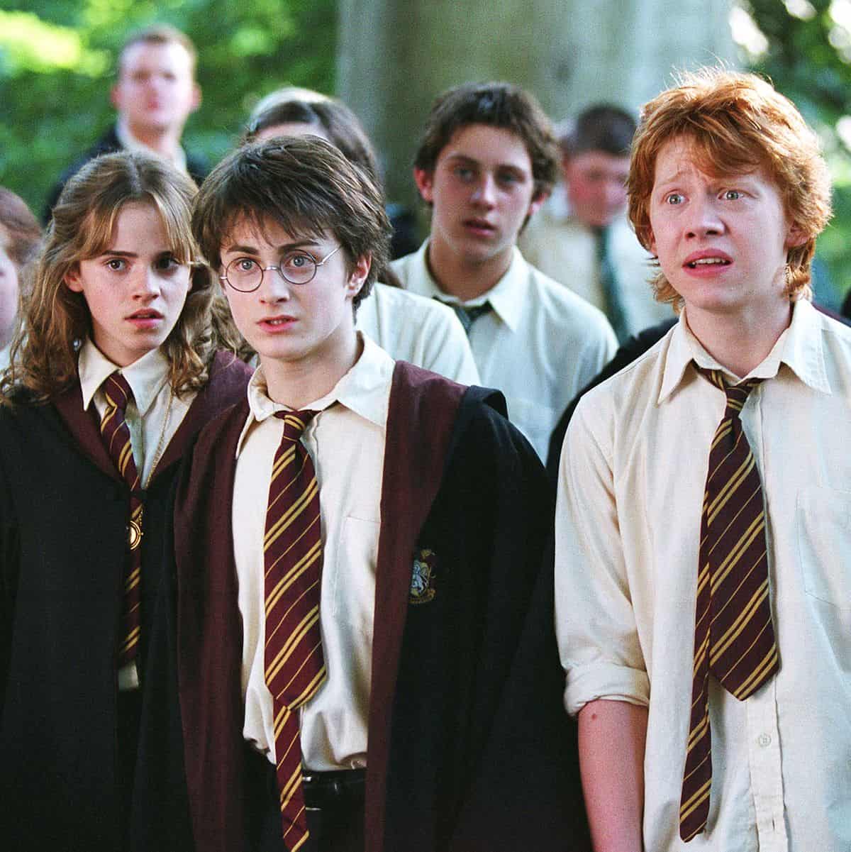 Emma Watson, Rupert Grint posing for the camera