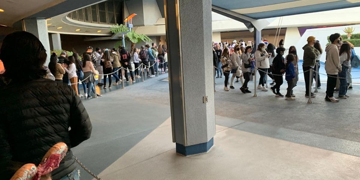 A group of people sitting at a airport