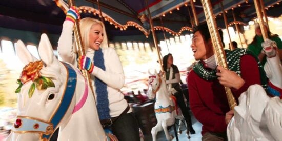 Guests riding Carousel