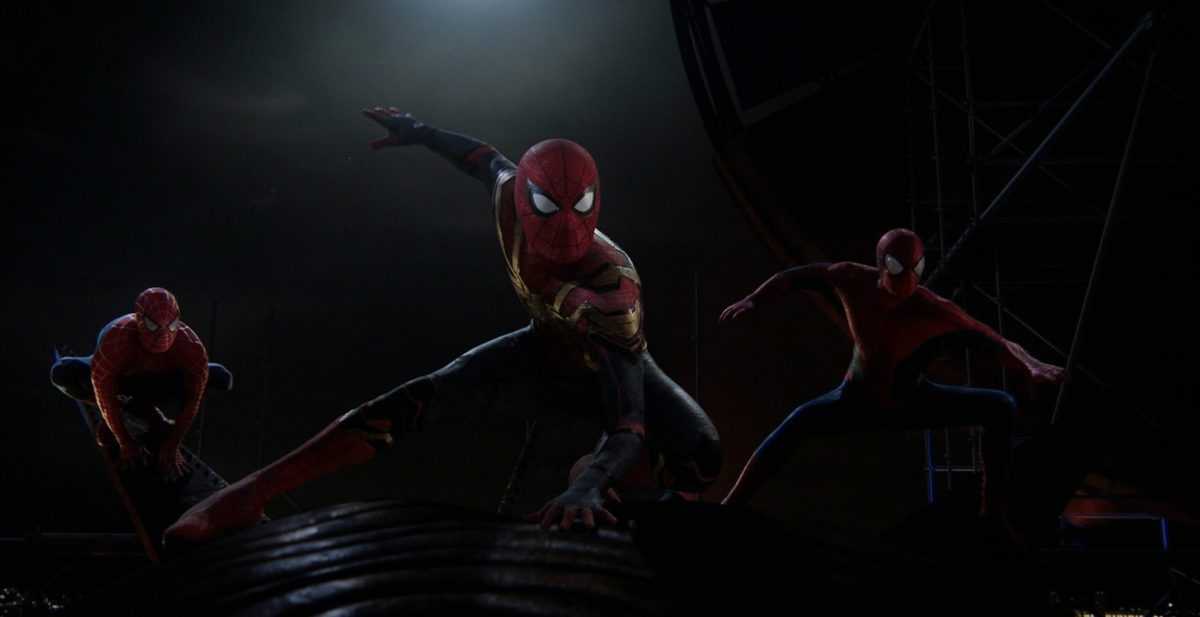 Andrew Garfield as Spider-Man (right), Tom Holland as Spider-Man (middle), and Tobey Maguire as Spider-Man (left)