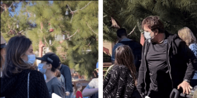 A woman standing in front of a crowd of people