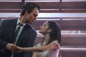 ansel elgort (left) and rachel zegler (right) dancing in west side story
