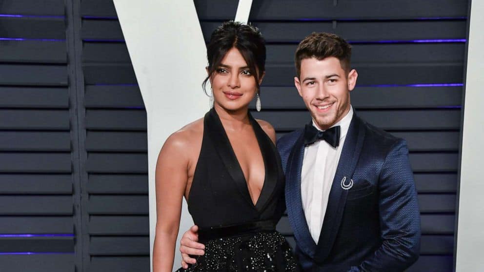 priyanka chopra (left) and nick jonas (right) in formalwear on red carpet