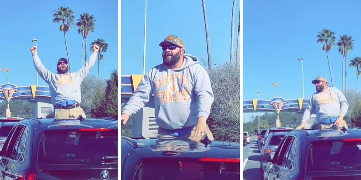 disney guest sticks out of car
