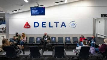 delta airlines gate with passengers