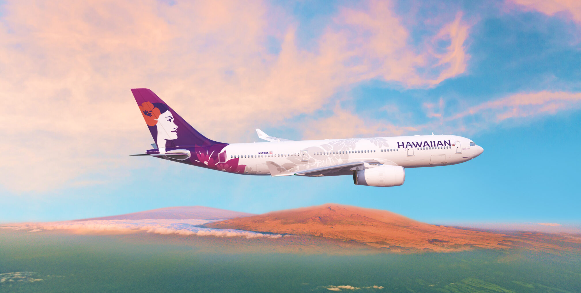 hawaiian airlines plane in flight sunset