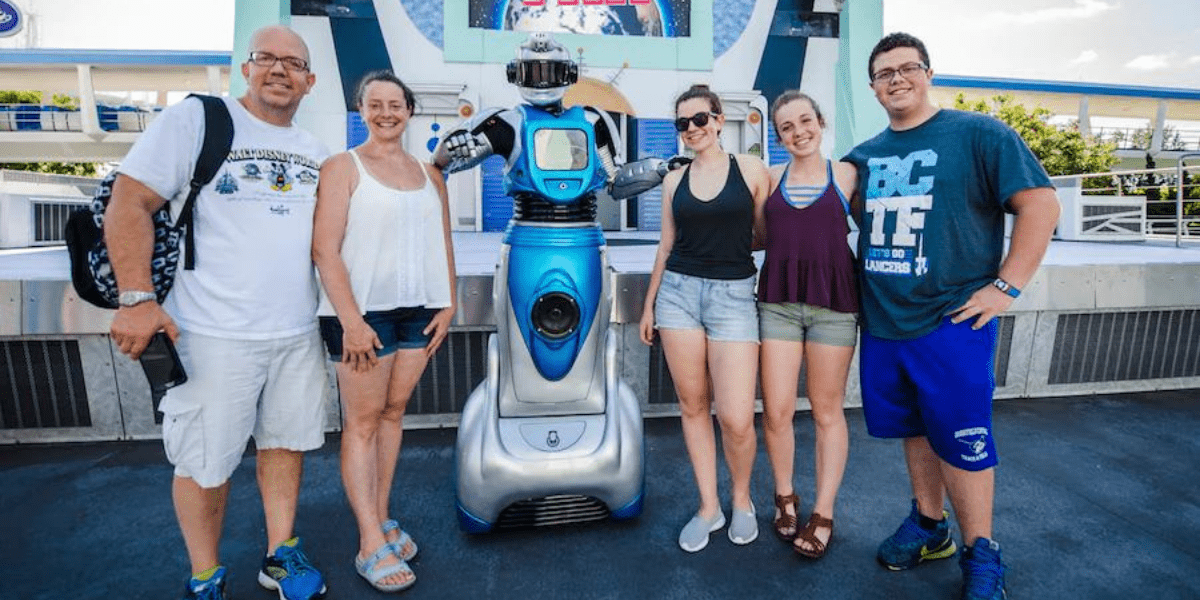 ican at tomorrowland with a family