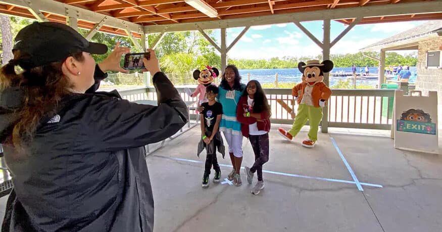 family photos with mickey and minnie at mickey's retreat