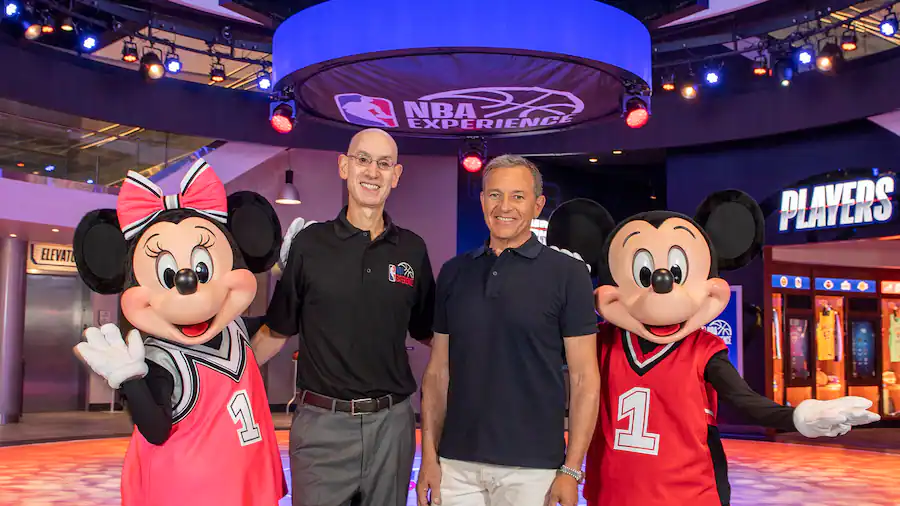 adam silver and bob iger with mickey and minnie at nba experience opening