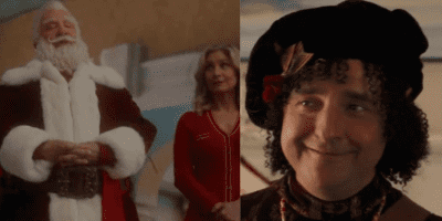 Tim Allen as Santa stands next to Mrs. Claus. Bernard the elf smiles.