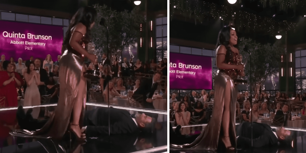 Quinta Brunson steps over Jimmy Kimmel to accept her Emmy.