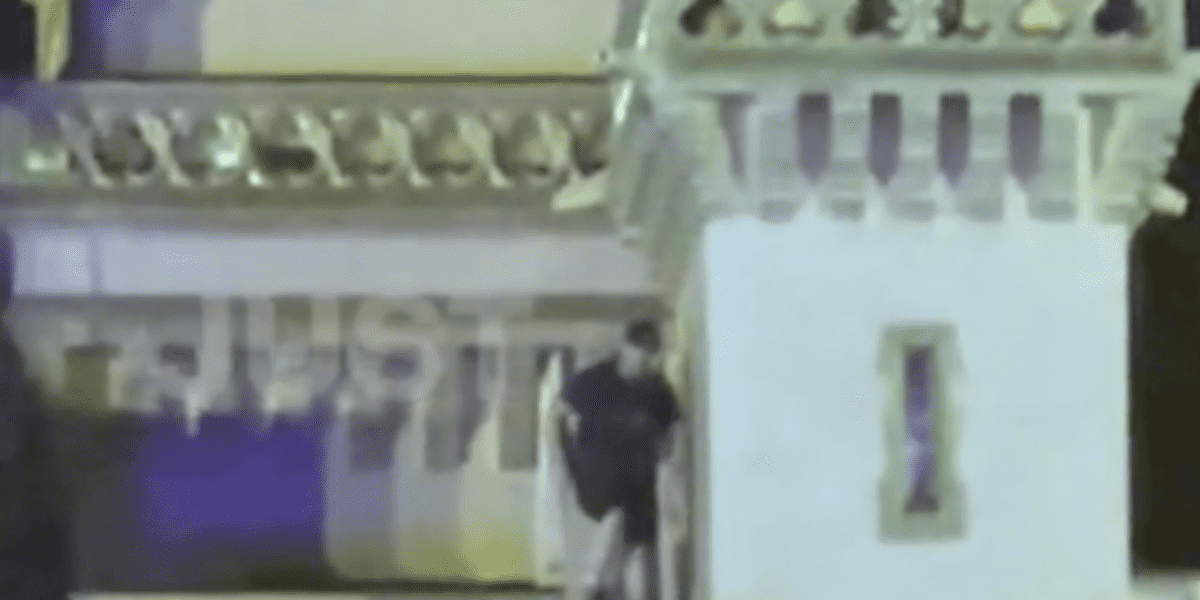 Man Climbs Cinderella Castle